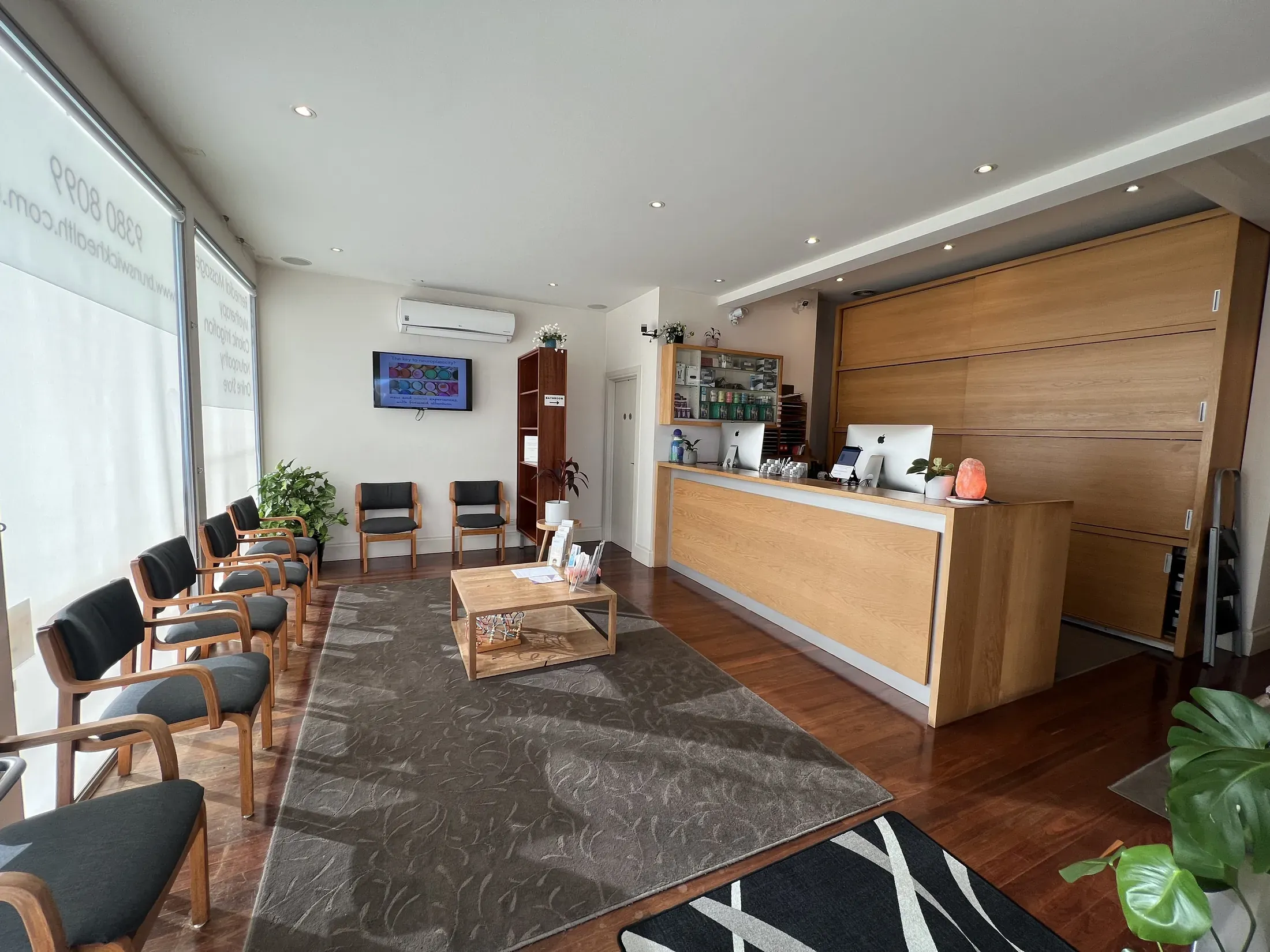 The reception and waiting area at Brunswick Health, looking towards the front desk