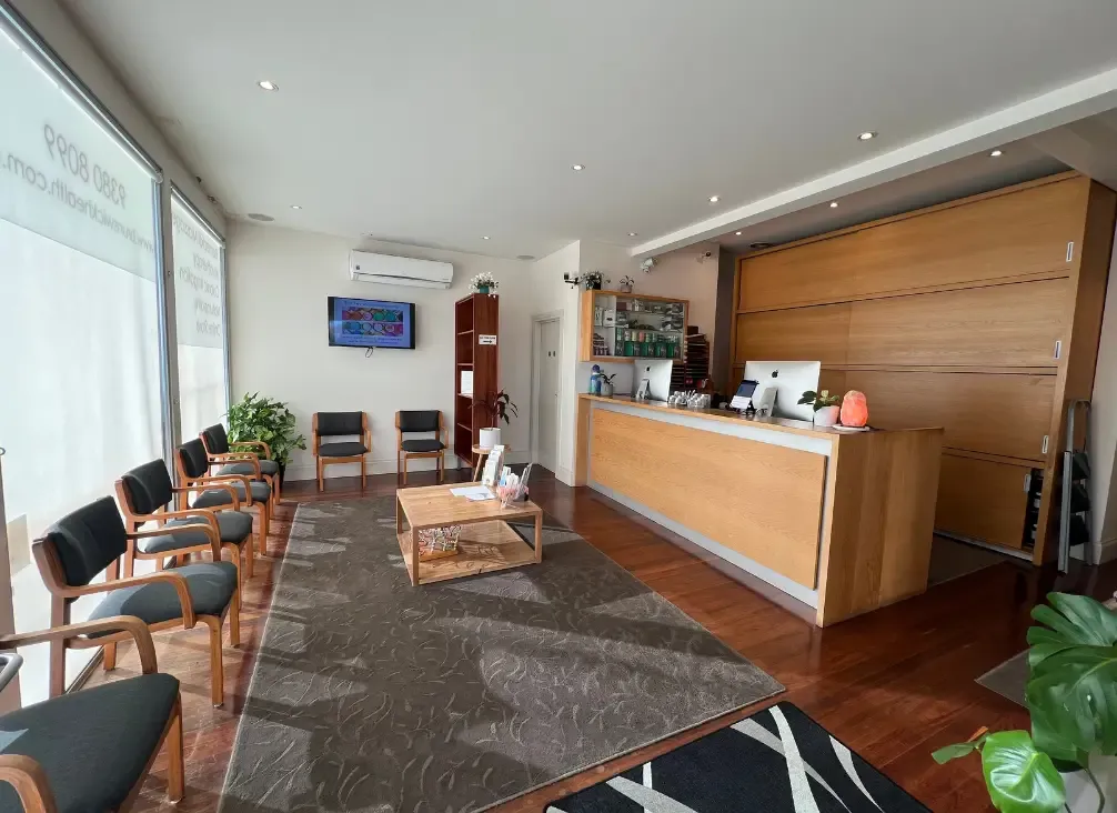 The waiting area and reception desk at Brunswick Health in Brunswick West