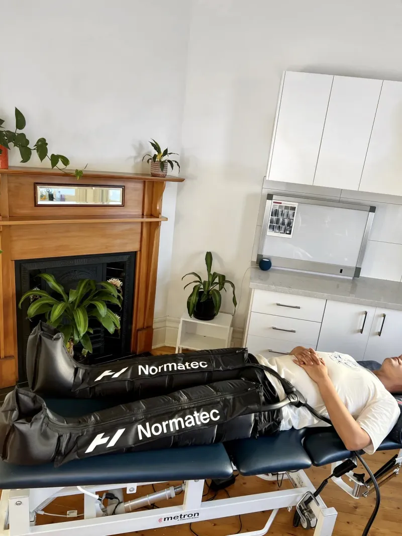 Compression therapy boots inflating around a patient's legs at Brunswick Health