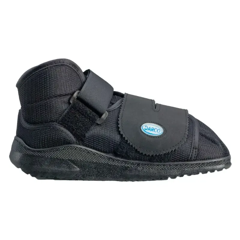 The Darco APB post-op boot in black, showing the two hook-and-loop straps and the rocker sole