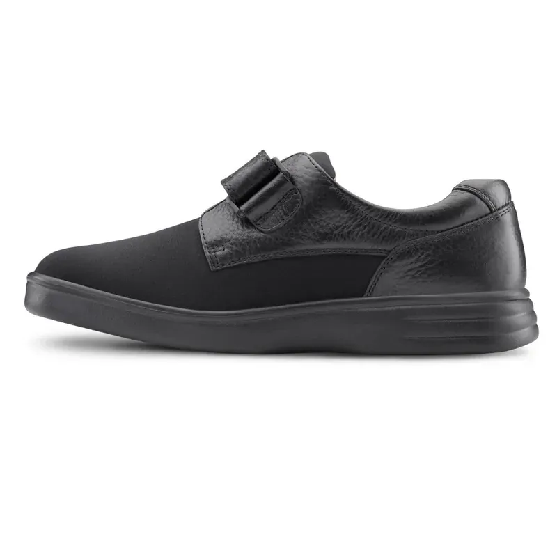 The Dr. Comfort Annie in black, outside profile showing the stretch Lycra panel and leather trim