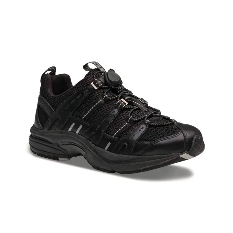 The Dr. Comfort Refresh women's sneaker in black, outside profile showing the toggle lace and the mesh panels
