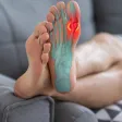 A raised foot with an anatomical overlay of the bones and a red glow across the ball of the foot