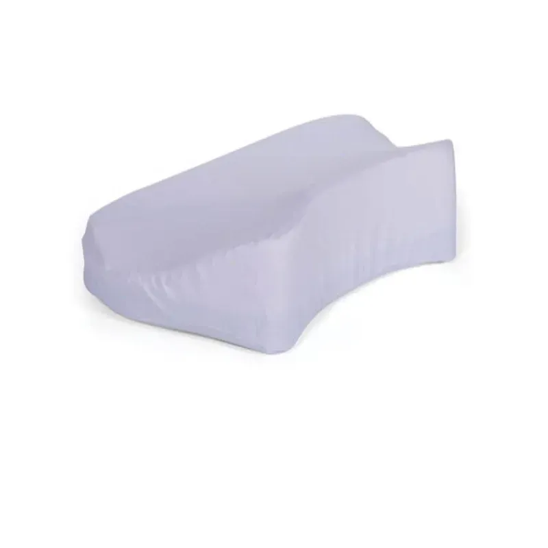 The pillow on its own, showing the scalloped cut-outs on both sides