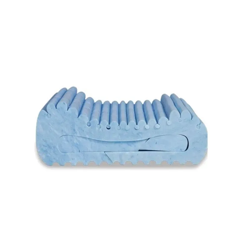 The gel-infused pillow out of its box, showing the two contoured ridges and the ventilation holes