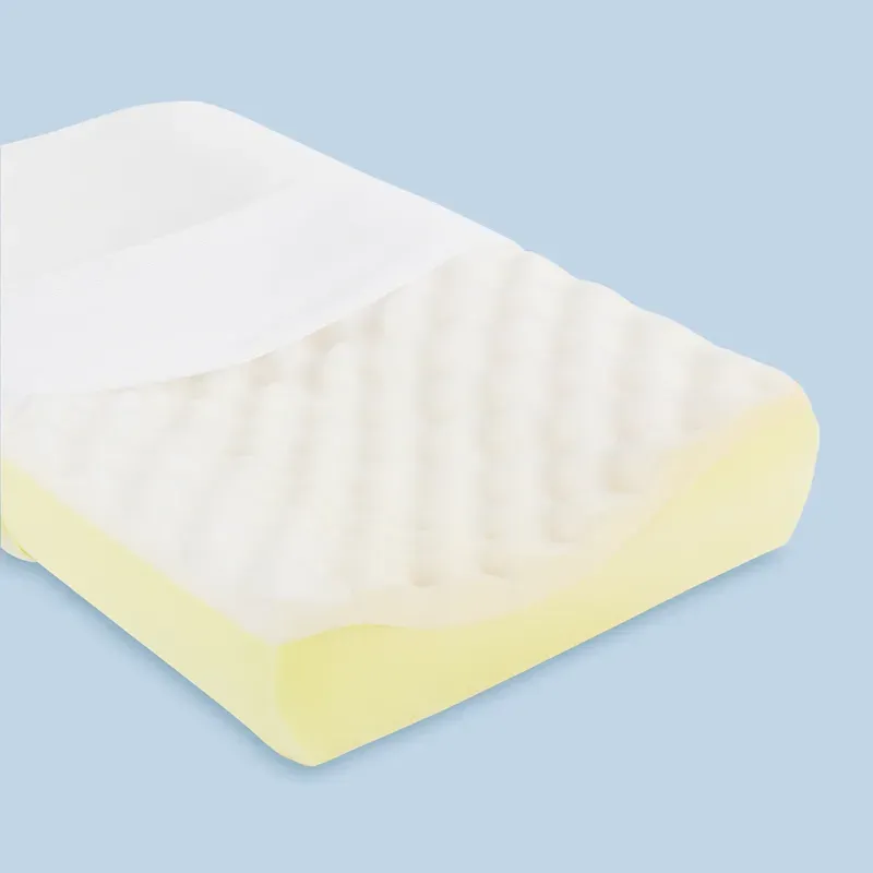 A children's pillow with a soft egg-foam top layer over a firmer yellow foam base