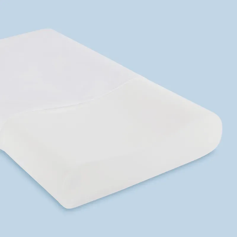 A contoured children's pillow with two different heights, one along each side