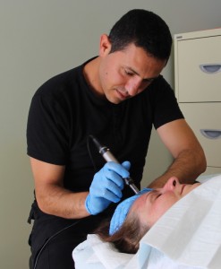 Niydalh conducting a Skin Needling Test Patch